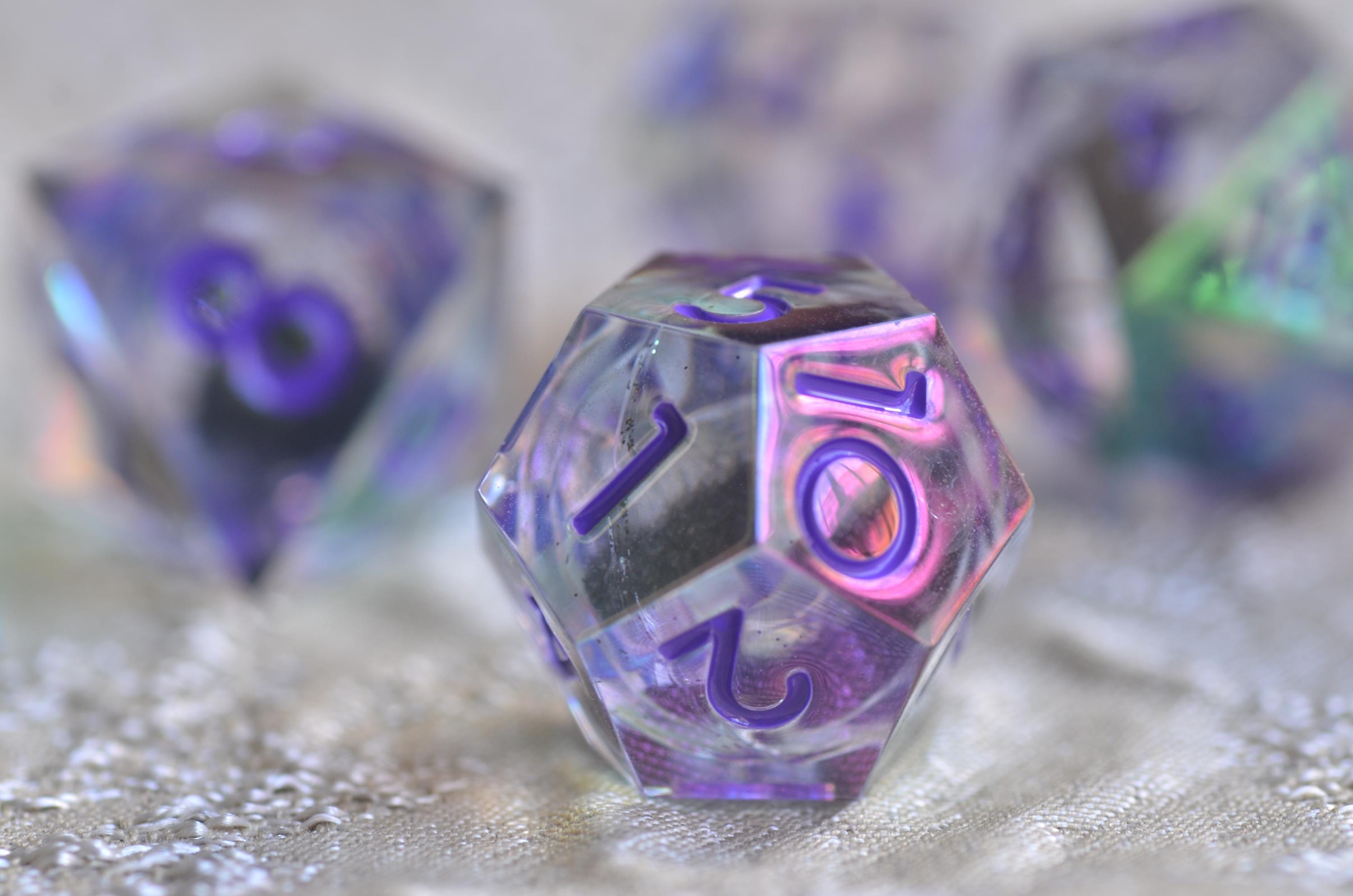 Cyberpunk Violet Iridescent Core Liquid Dice โ Mesmerizing Black Sand in Motion- Stunning RPG Dice Set | Sharp Edge Resin Polyhedral Dice