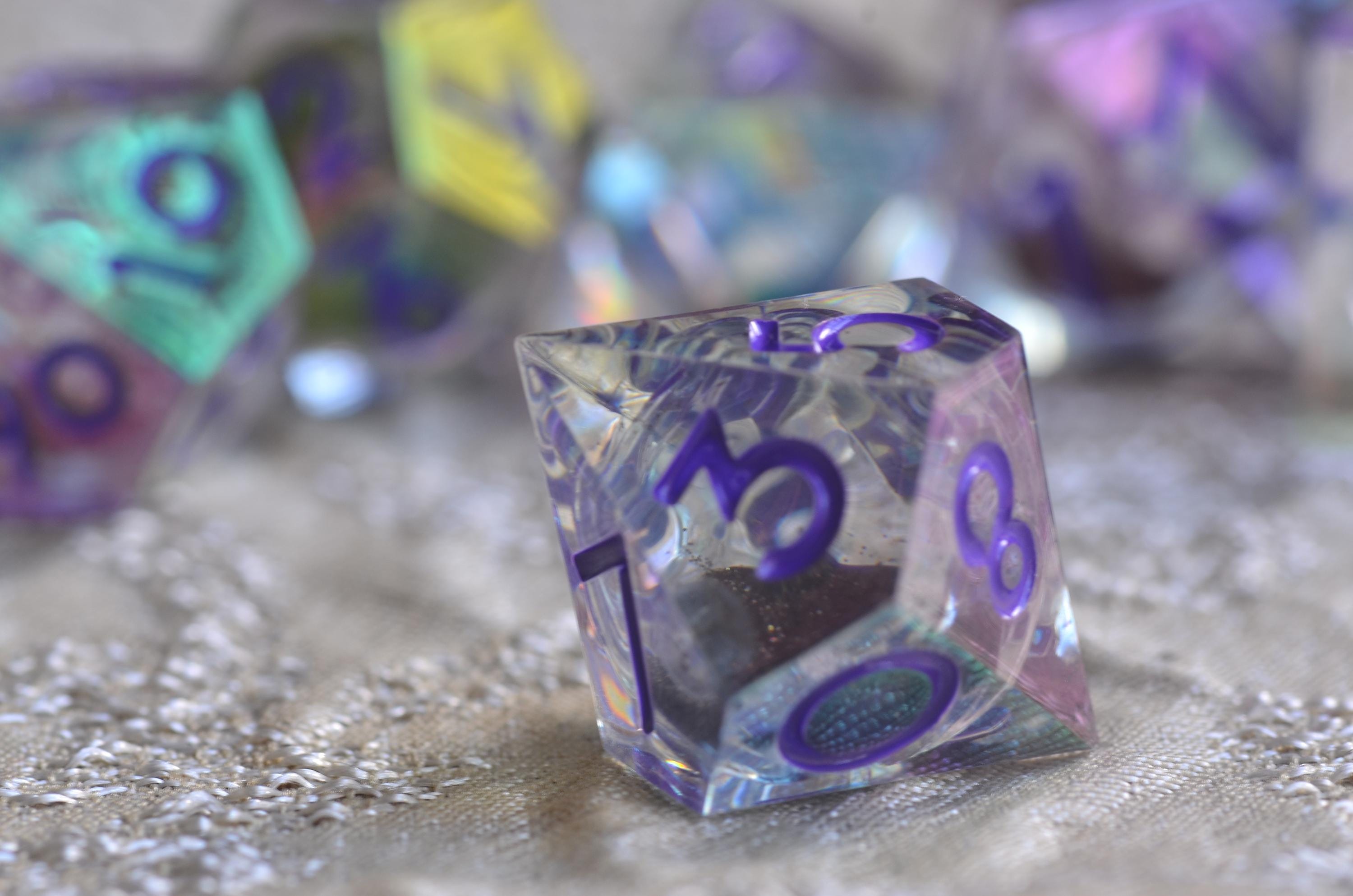Cyberpunk Violet Iridescent Core Liquid Dice โ Mesmerizing Black Sand in Motion- Stunning RPG Dice Set | Sharp Edge Resin Polyhedral Dice